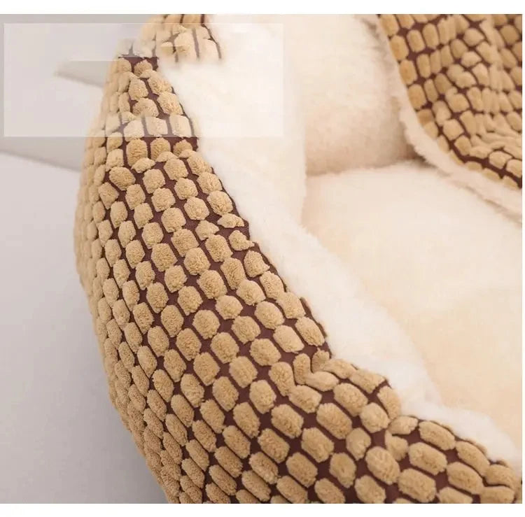 Close-up of a textured blanket with a honeycomb pattern on a white background