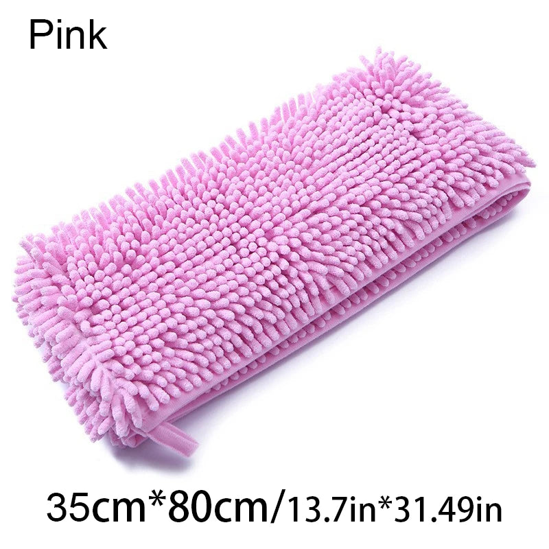 Pink microfiber cleaning cloth on a white background
